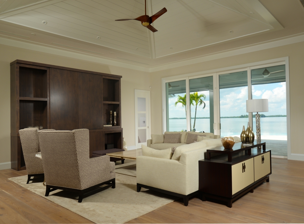 Custom Home in The Moorings white living room with pyramid ceiling in The Moorings - Vero Beach, FL